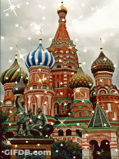 Colorful Building With Statue Saying Tatian GIF