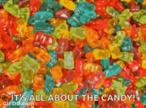 Colorful Candy Pile Saying It's All About The Candy GIF