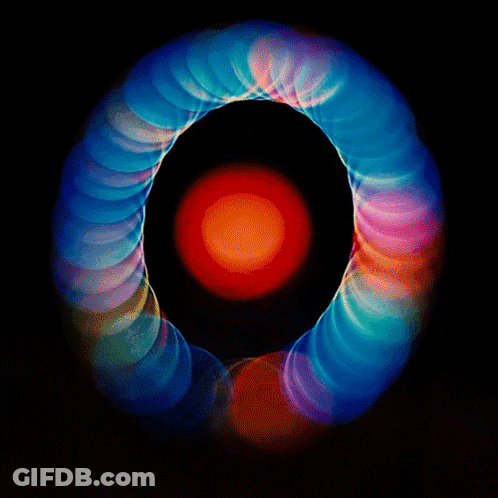 Colorful Circle With Red Center Surrounded By Blue Circles GIF