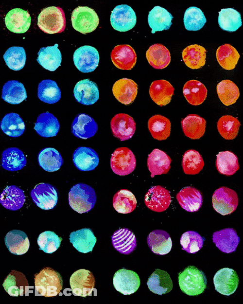 Colorful Circles Creating Letter T GIF