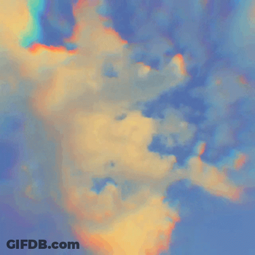 Colorful Clouds In A Blue Sky With A Rainbow In The Middle GIF