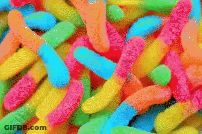 Colorful Gummy Worms In Banana Shape GIF