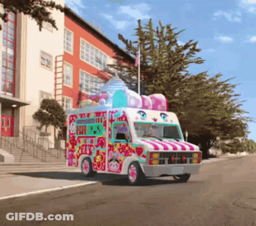 Colorful Ice Cream Truck Driving Past School GIF