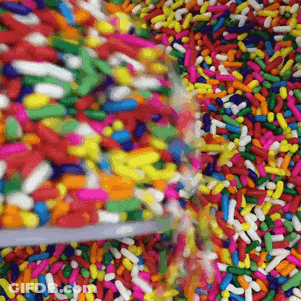 Colorful Sprinkles Being Poured GIF