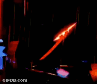 Colorful Superhero Flying Through Fire GIF