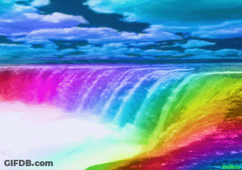 Colorful Waterfall Under Blue Sky GIF