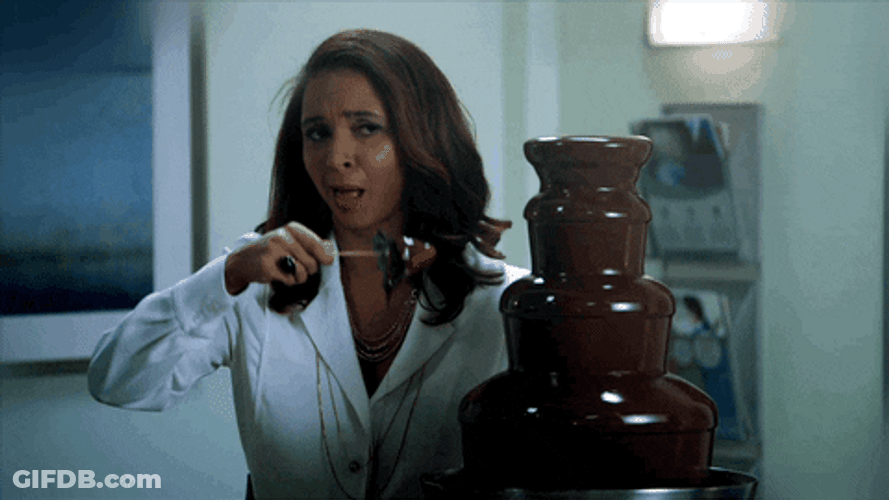 Comedian Maya Rudolph Sensual Licking Chocolates GIF