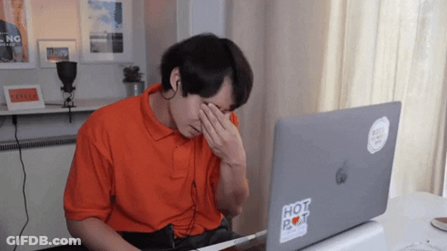 Comedian Nigel Ng Having Headache Touch His Nose GIF