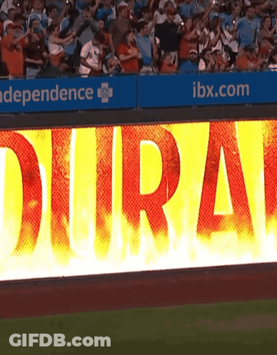 Commanders Football Player Standing In Front Of Crowd GIF