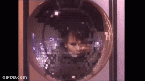 Comme Des Garçons PLAY Logo With Three Red Hearts GIF