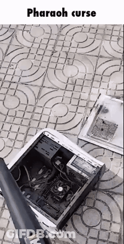 Computer Case Laying On Tiled Floor Pharaoh Curse GIF