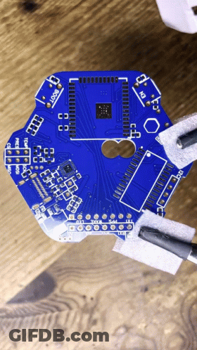 Computer Chip Surrounded By Squares GIF