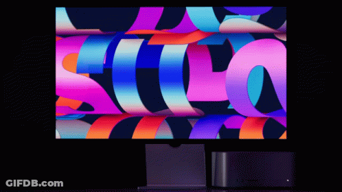 Computer Monitor Displaying Colorful Letter S GIF