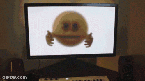 Computer Monitor Displaying Smiley Face With 89 GIF