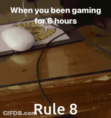 Computer Mouse On Desk Next To Rule 8 GIF
