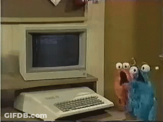 Computer On Desk With Keyboard And Monitor GIF