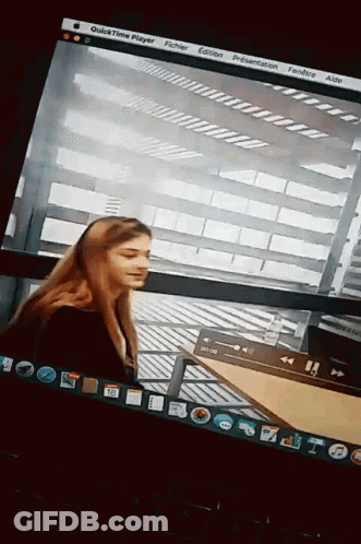 Computer Screen With Woman And QuickTime Player GIF