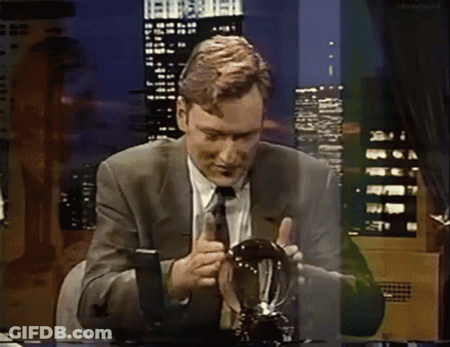 Conan O'Brien Rubbing Crystal Ball GIF