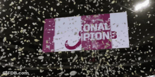 Confetti Thrown In Air With National Champions Sign GIF