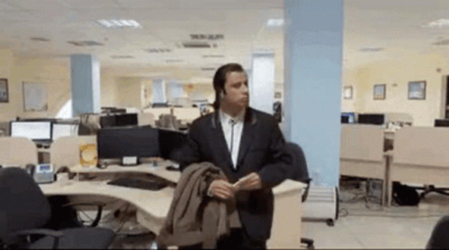 Confused Actor John Travolta In The Office GIF
