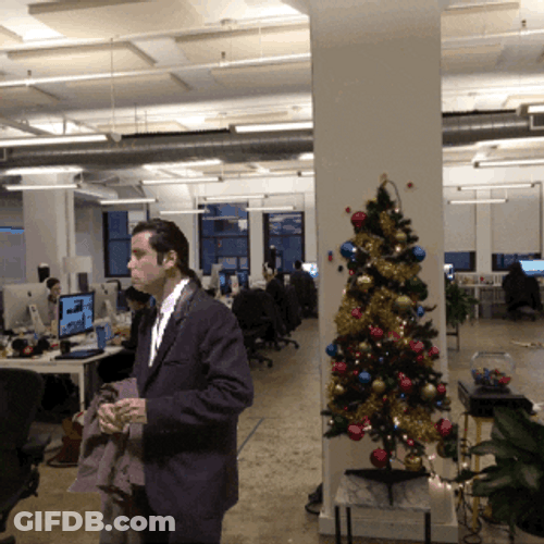 Confused Actor John Travolta Looks Back GIF