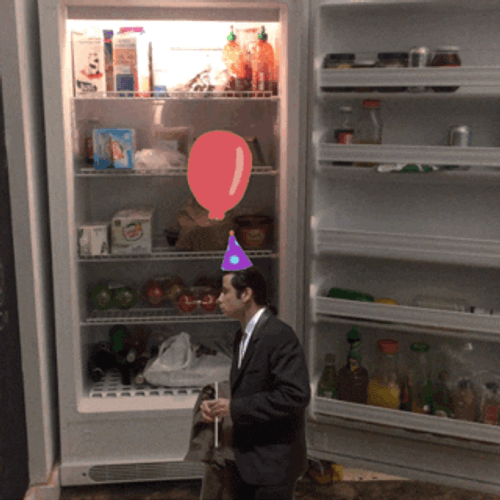 Confused Actor John Travolta With Balloon GIF