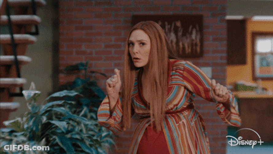 Confused Elizabeth Olsen Investigates GIF