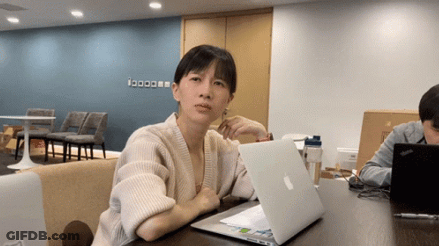 Confused Lady Throwing Computer GIF
