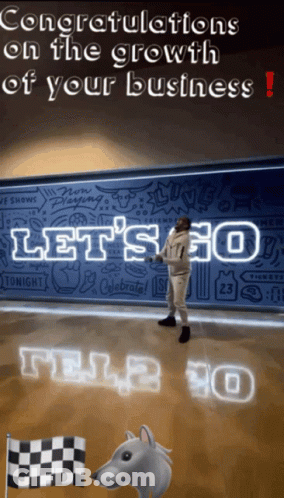 Congratulations On The Growth Of Your Business With A Man Standing In Front Of A Wall GIF
