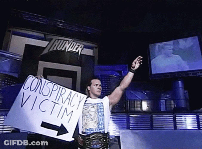 Conspiracy Victim Placard GIF
