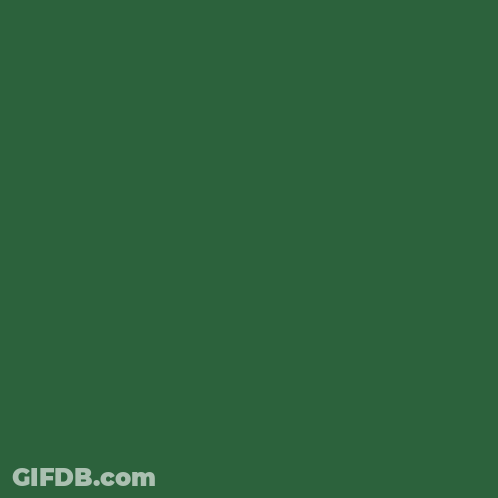 Construction Worker Wearing Hard Hat And Overalls In Front Of White Board GIF