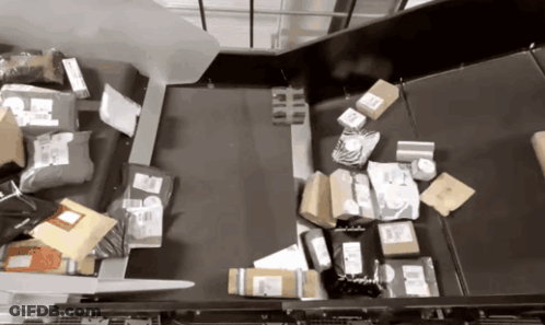 Conveyor Belt Filled With DHL Packages GIF