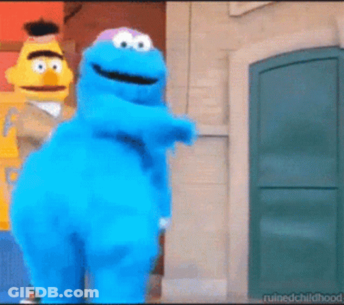 Cookie Monster And Bert Standing Next To Each Other In Front Of Door GIF
