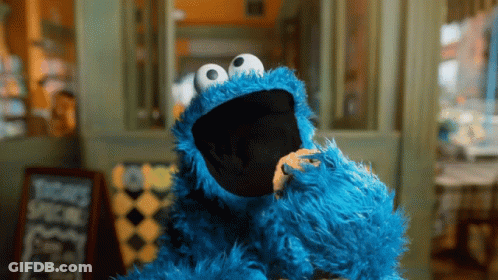 Cookie Monster Eating Cookie By Window GIF