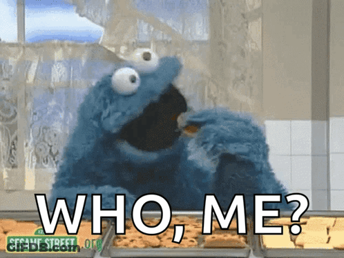 Cookie Monster From Sesame Street Eating A Cookie And Asking Who Me GIF