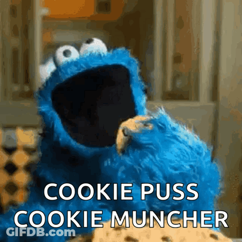 Cookie Monster From Sesame Street Eating A Cookie With The Words Cookie Puss Cookie Muncher GIF
