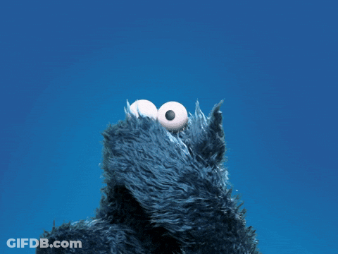 Cookie Monster From Sesame Street Looks Up At The Sky With His Mouth Open GIF