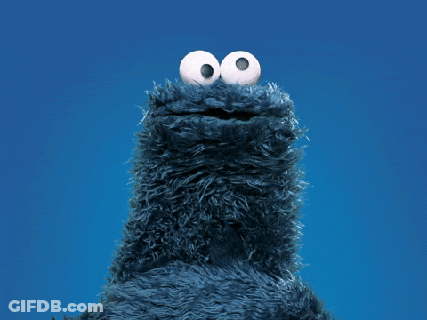 Cookie Monster From Sesame Street Looks Up Into The Sky GIF
