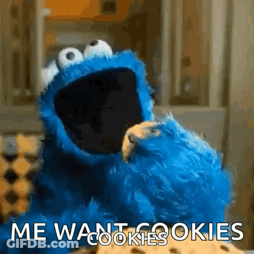 Cookie Monster Holding Cookie Saying Me Want Cookies GIF