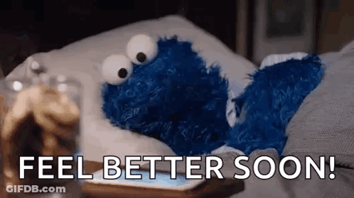 Cookie Monster Lying In Bed With Pillow And Phone GIF