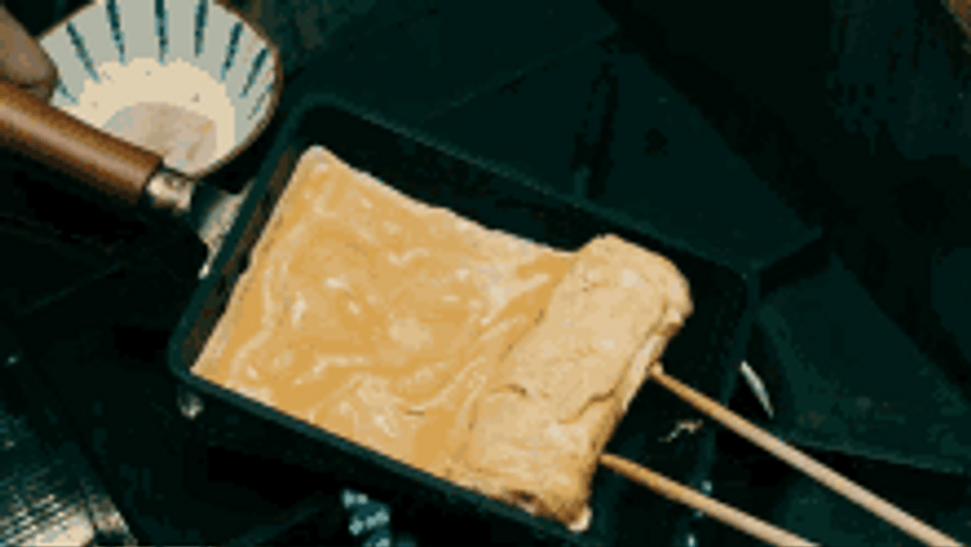 Cooking Egg Roll GIF