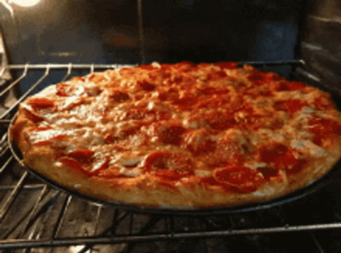 Cooking Pepperoni Pizza GIF