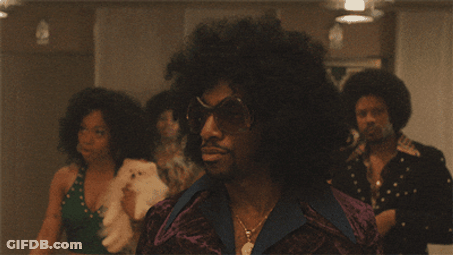 Cool Afro Haired Guy Slow Motion Walk GIF