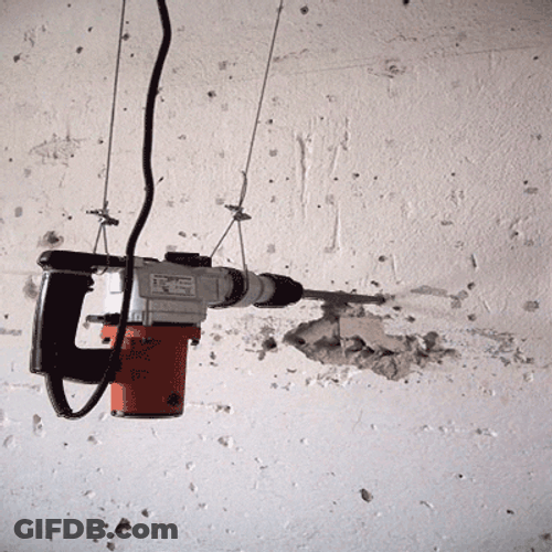 Cool Drill On The Wall GIF