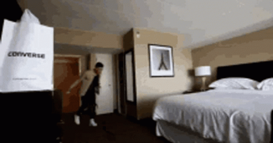 Cool Guy Jump On Bed GIF