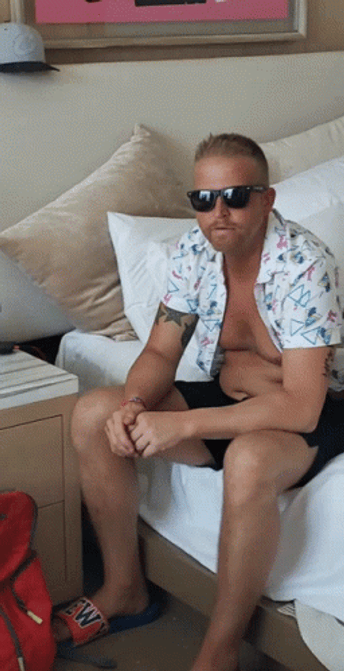 Cool Guy Sitting In Bed GIF