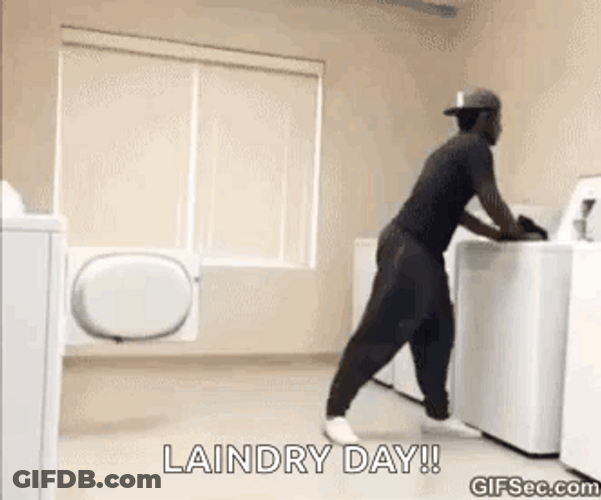 Cool Man Dancing While Doing Laundry GIF