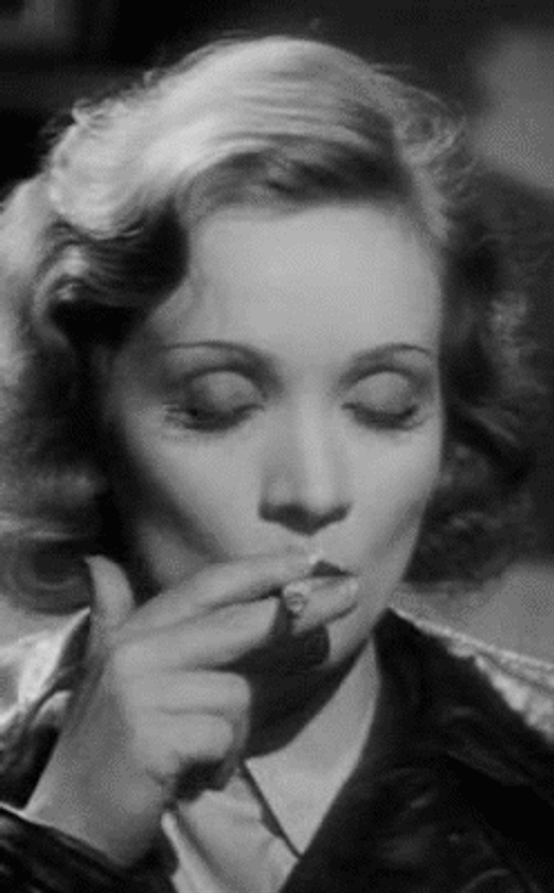 Cool Marlene Dietrich Serious Smoking GIF