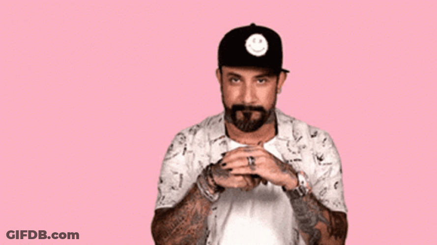 Cool Tattoed Guy Wearing Cap Birdman Hand Rub GIF