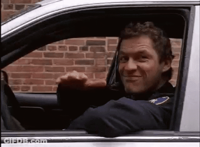 Cop Making Meh Face GIF